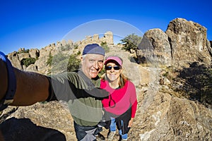 Middle age outdoor couple selfie