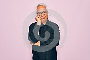 Middle age senior grey-haired handsome man wearing glasses and elegant shirt thinking looking tired and bored with depression