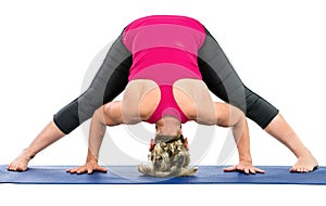 Middle age woman doing yoga exercises