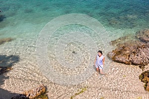 Middle age woman enjoying summer in Zakynthos island in Greece.