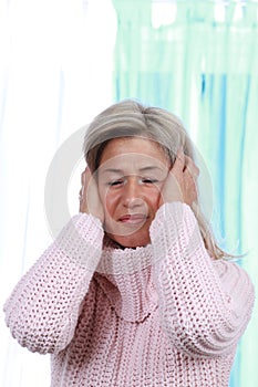 Middle age woman with headache and migraine