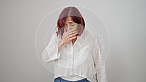 Middle age woman sneezing over isolated white background