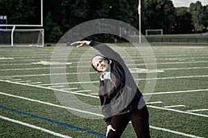 Middle age woman staying fit on track