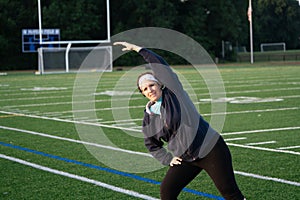 Middle age woman staying fit on track