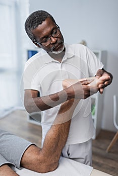 middle aged african american physical therapist