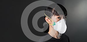 Middle aged of asia chinese woman wearing medical N95 mask