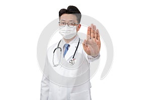 A middle-aged Asian doctor raises his hand and expresses his disapproval