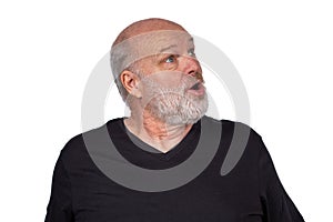 Middle-Aged Bearded Man in Black T-Shirt Expressing Surprise Looking Up on White Background - Casual Lifestyle Portrait
