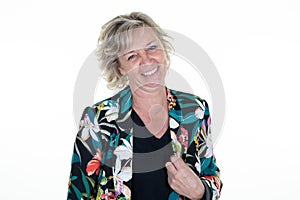 Middle aged blonde senior sixties woman mature in white background