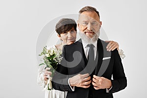 Middle-aged bride and groom in
