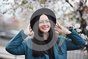 Middle-aged brunette woman on the background of beautiful nature