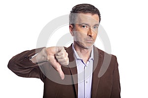 Middle Aged Businessman Doing a Thumbs Down Gesture