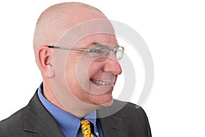 Middle-aged businessman giving a wry smile