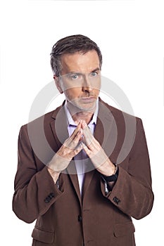 Middle Aged Businessman Looking Secretive