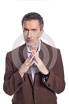 Middle Aged Businessman Looking Secretive