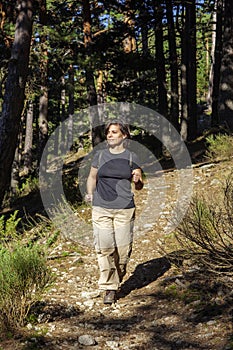 Middle-aged Caucasian woman hiking on Sierra de Guadarrama. Madrid, Spain