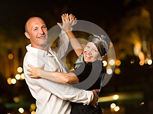 Middle-aged couple dancing