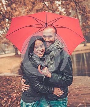 Middle-aged couple outdoors on autumn day