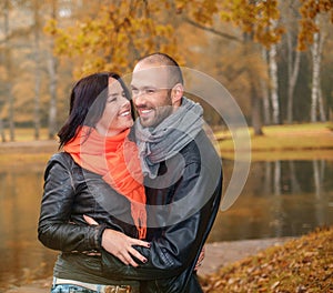 Middle-aged couple outdoors on nautumn day