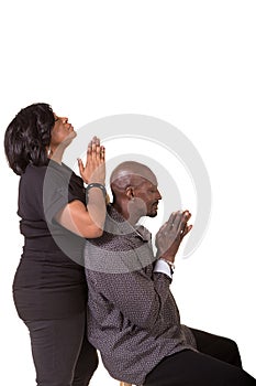 Middle aged couple praying