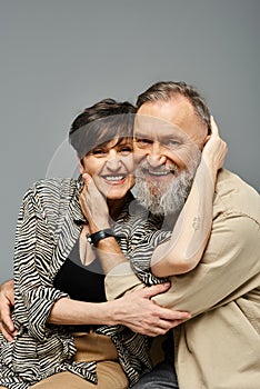 A middle-aged couple in stylish