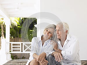 Middle Aged Couple On Verandah