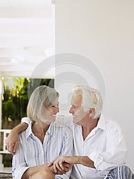 Middle Aged Couple On Verandah