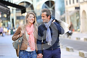 Middle-aged couple walking in the streets