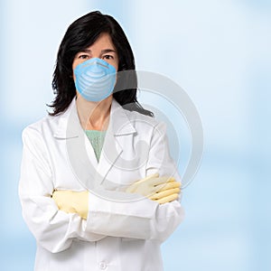 Middle aged doctor wearing surgical mask and gloves