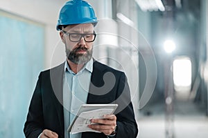 Middle-aged engineer in hardhat