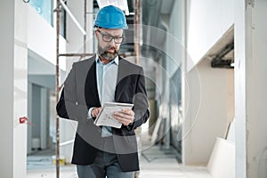 Middle-aged engineer in hardhat