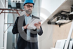 Middle-aged engineer in hardhat