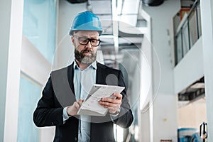 Middle-aged engineer in hardhat