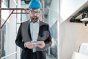 Middle-aged engineer in hardhat