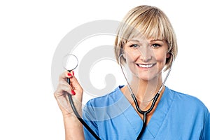 Middle aged female doctor with a stethoscope