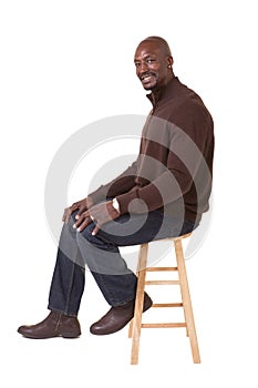 Middle aged male sitting down