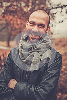 Middle-aged man on beautiful autumn day