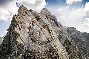 Middle aged man enjoying adventure in the mountains