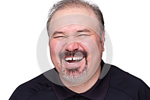 Middle-aged man enjoying a good laugh