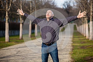 Middle-aged man enjoying the sunshine