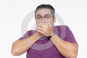A middle aged man gasping in controversy. Shock value reaction. Isolated on a white background