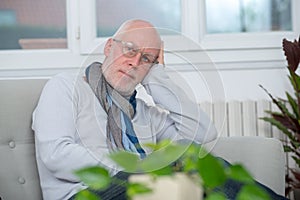 Middle-aged man relaxing a moment in sofa