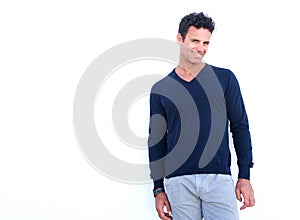 Middle aged man smiling against white background