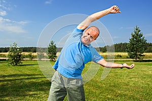 Middle-aged man streching photo