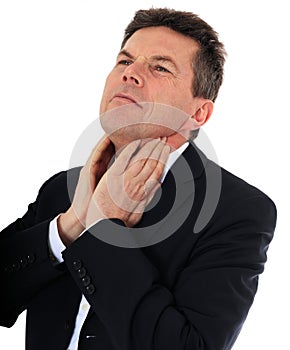 Middle aged man suffers from sore throat