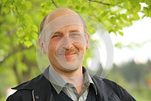 Middle-aged man in the summer park