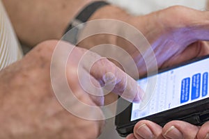 Middle-aged Man Typing a Text Message.