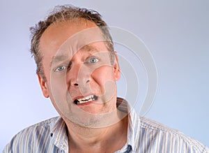 Middle-Aged Man Unhappy About Something