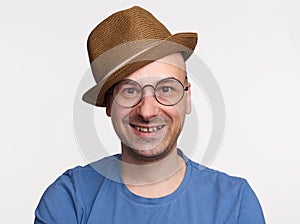 Middle-aged man wearing spectacles and hat