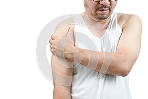 A middle aged man in white veat suffering from arm and shoulder pain isolated
